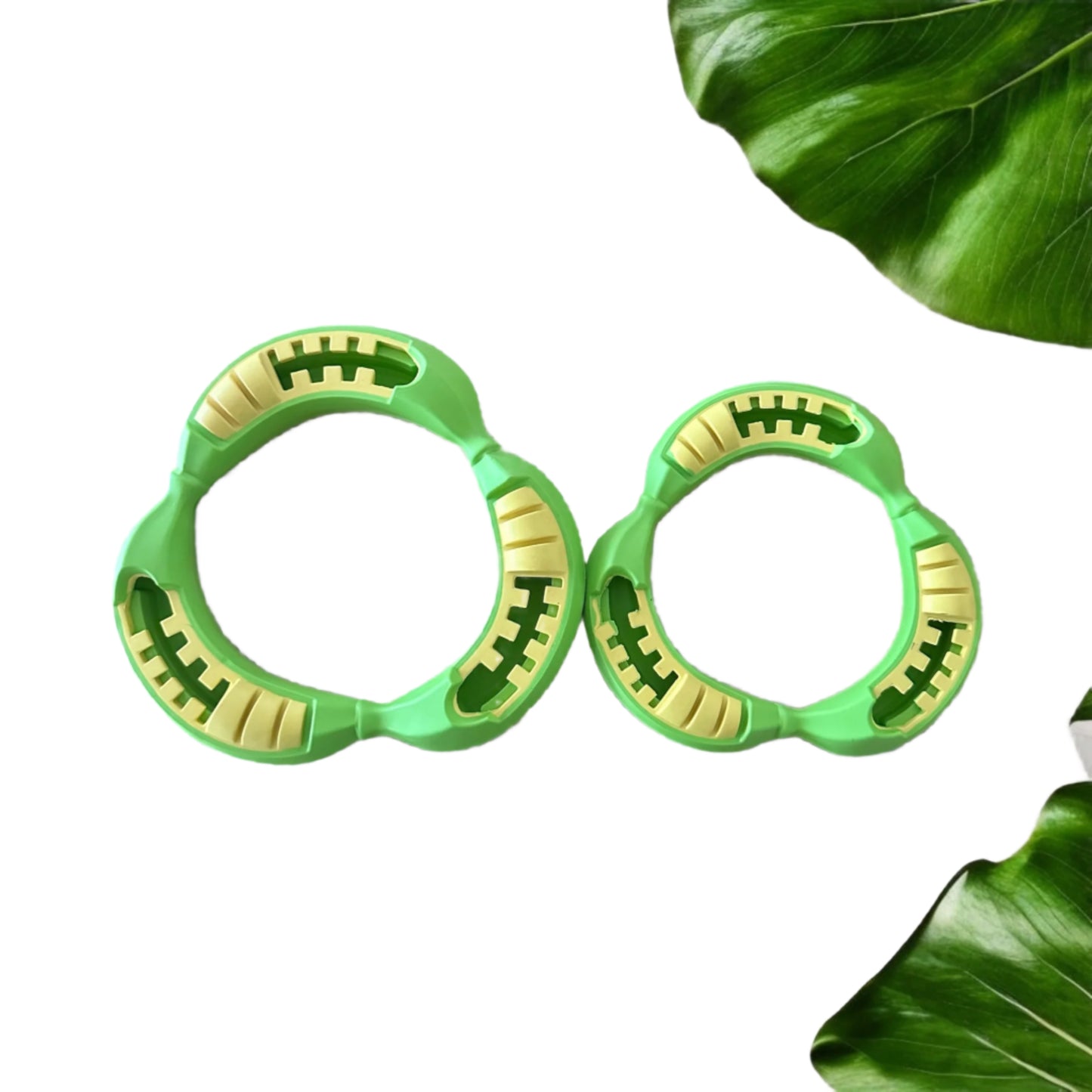 Two rubber Na Na Ring dog toys. Large and small in green. Suitable for tug o war and fetch.