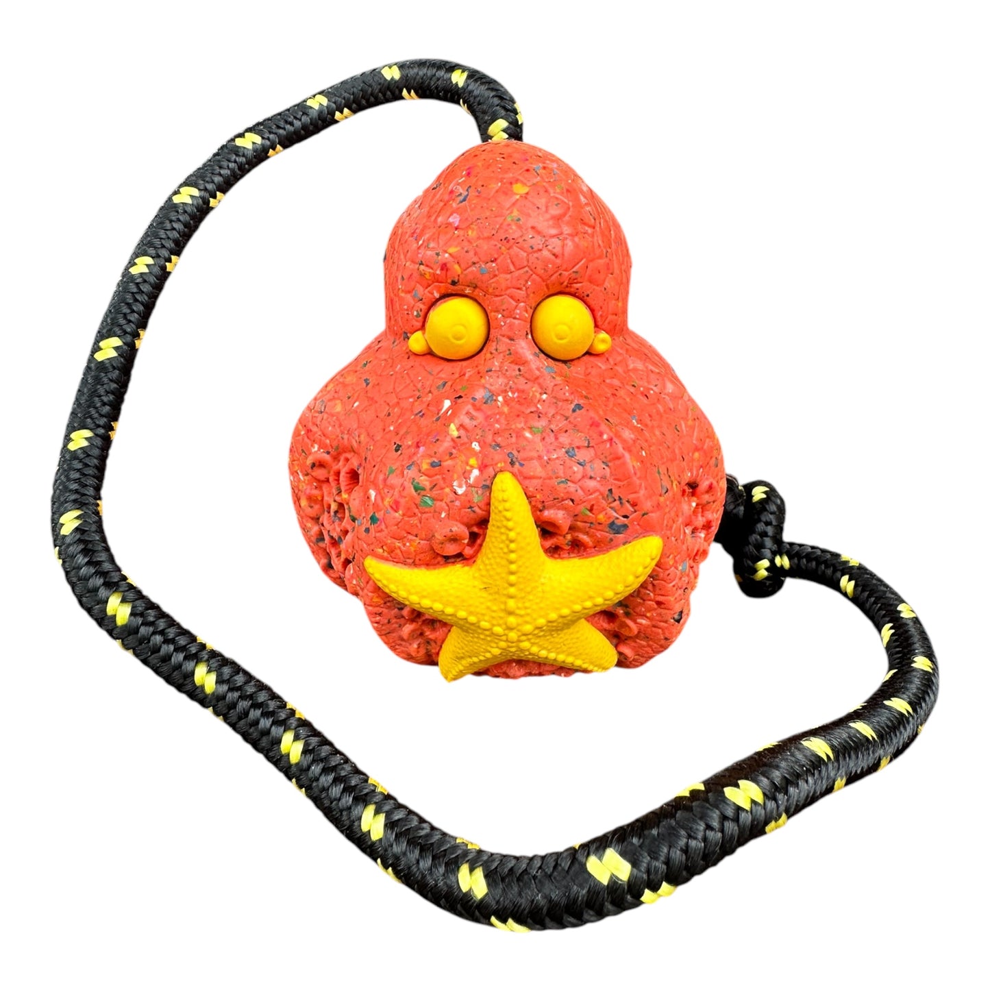 Recycled rubber octopus dog toy in orange with yellow starfish.