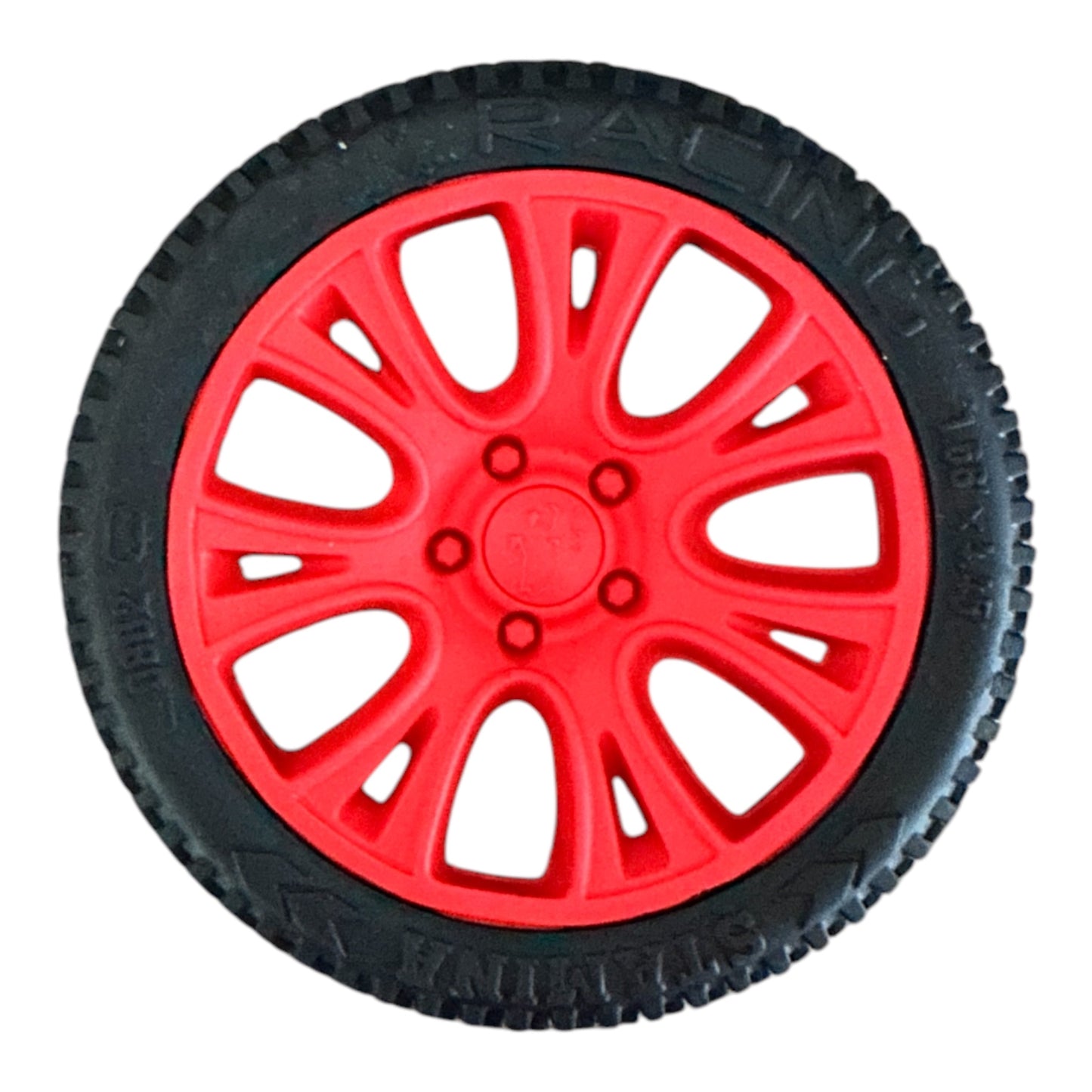 Red-rimmed tyre made out of rubber that is suitable for strong dogs to chew on.