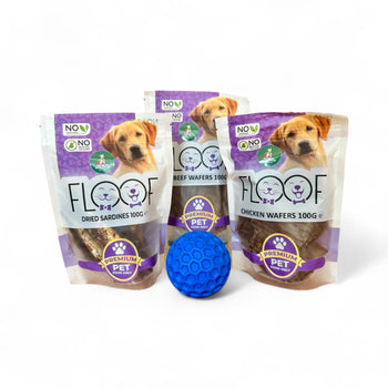 Three packages of Floof pet treats with a blue dog toy on a white background