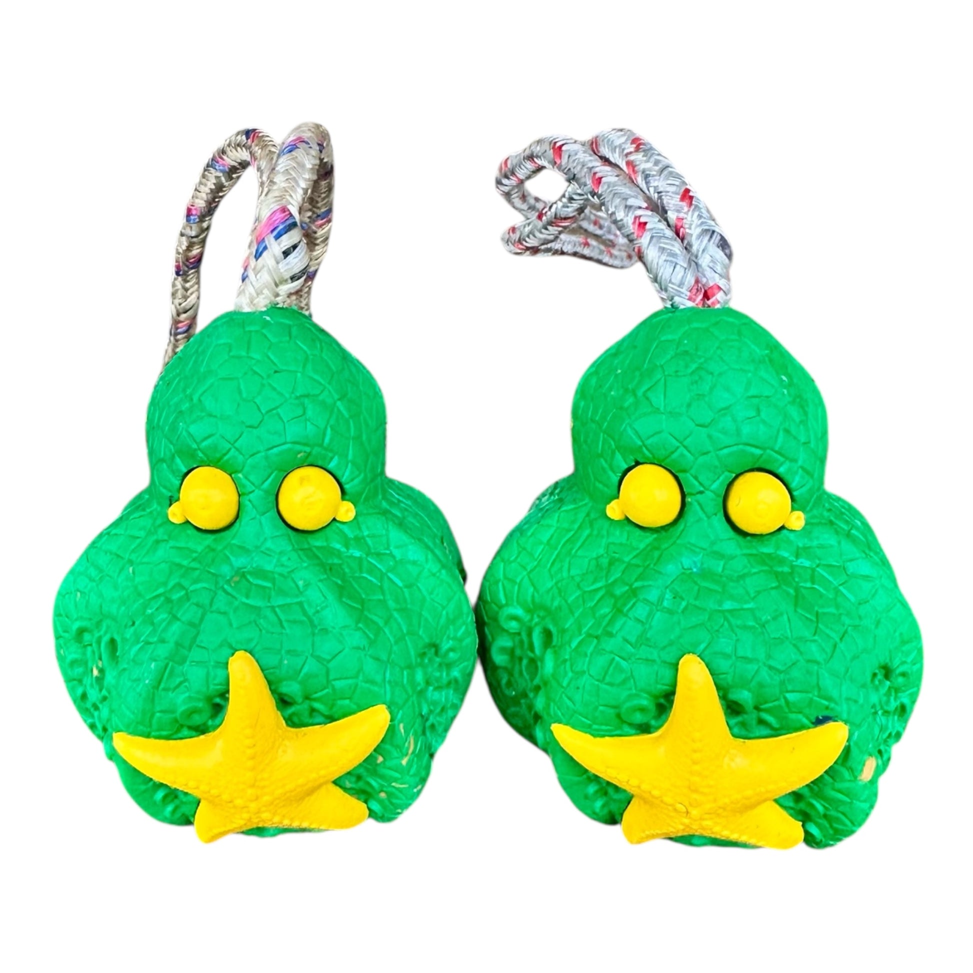 green and yellow octopus dog chew toy made from tough rubber which is able to withstand the strongest of chewers