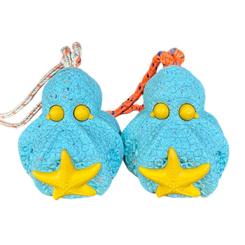 tough sustainable rubber dog chew toy in the shape of an octopus and starfish