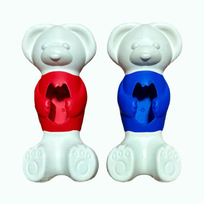 Two little rubber dog toys in the shape of a bear. One red and the other blue; both hold treats.